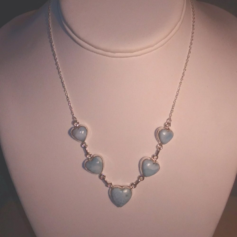 Brand new !32.32cts of natural blue Larimar hearts set in sterling silver .